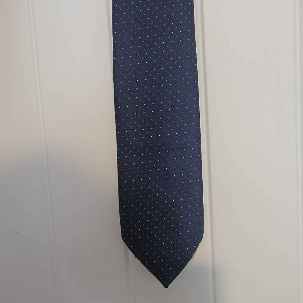 Navy tie with white and red dots